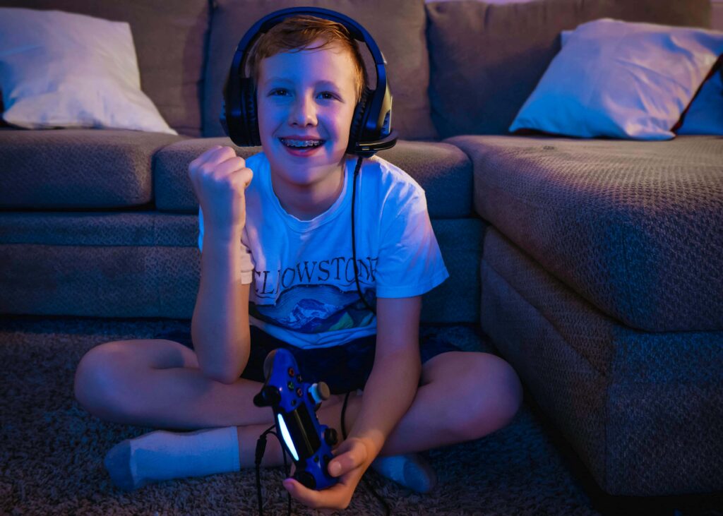 kid playing video games